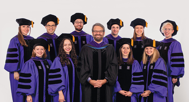 Furman Academic and Public Policy Scholars, Back Row: Victoria Wenger, Samuel Himel, Sam Bieler, Adam Kern, Sarah Coco, Evan Gilbert Front Row: Alison Perry, Meghan Racklin, Elizabeth Jánszky, and Natalie Jacewicz. The graduates were hooded by the Honorable Jesse Furman