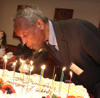 Derrick Bell in 2010, blowing out the candles at his 80th birthday 