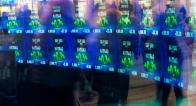 Screens with stocks at the New York Stock Exchange
