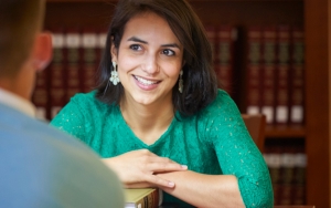Student at desk in the library