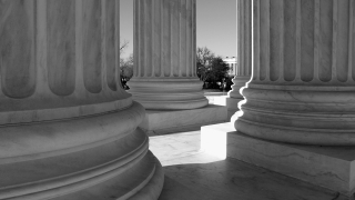 Supreme Court columns in black and white