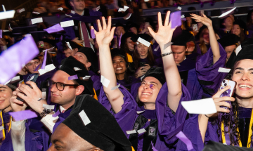Cheering graduates at NYU Law Convocation 2026