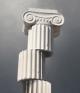 Fragmented greek column with storm clouds in background