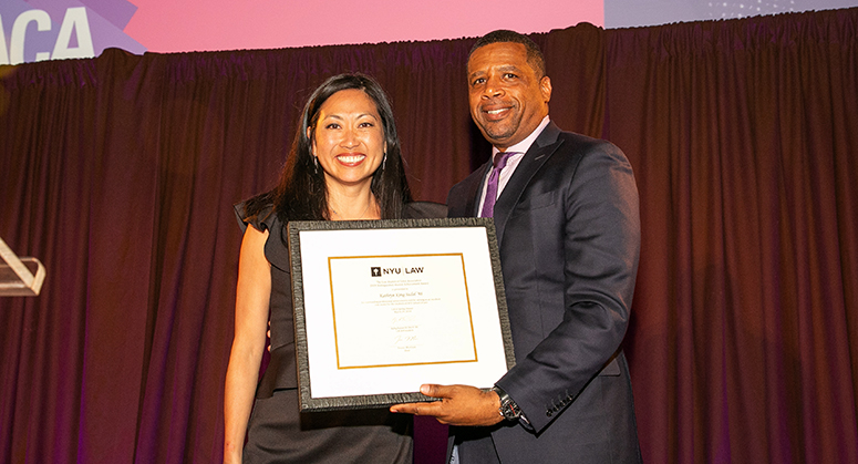 Kathryn King Sudol ’98 being presented with award