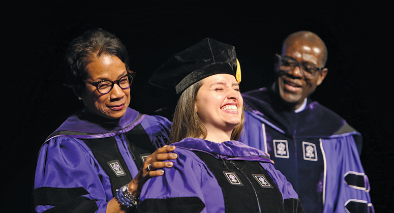 Law School student being hooded at Convocation