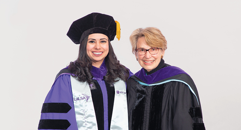 Thomas E. Heftler Scholar Melissa Quintana was hooded by Lois Weinroth