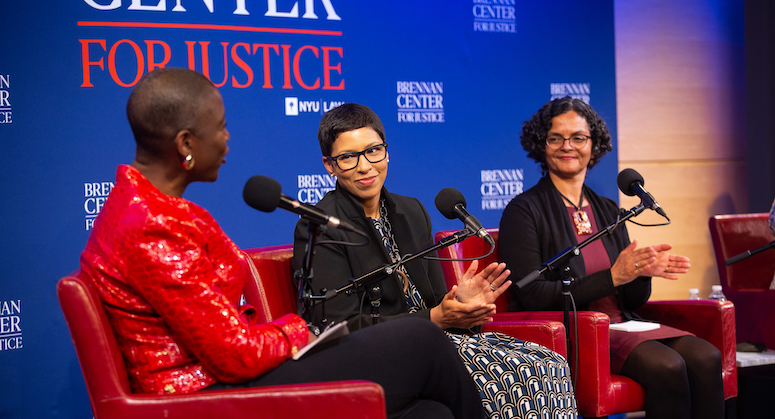 Panelists seated during Abortion is Essential to Democracy panel on April 20, 2022