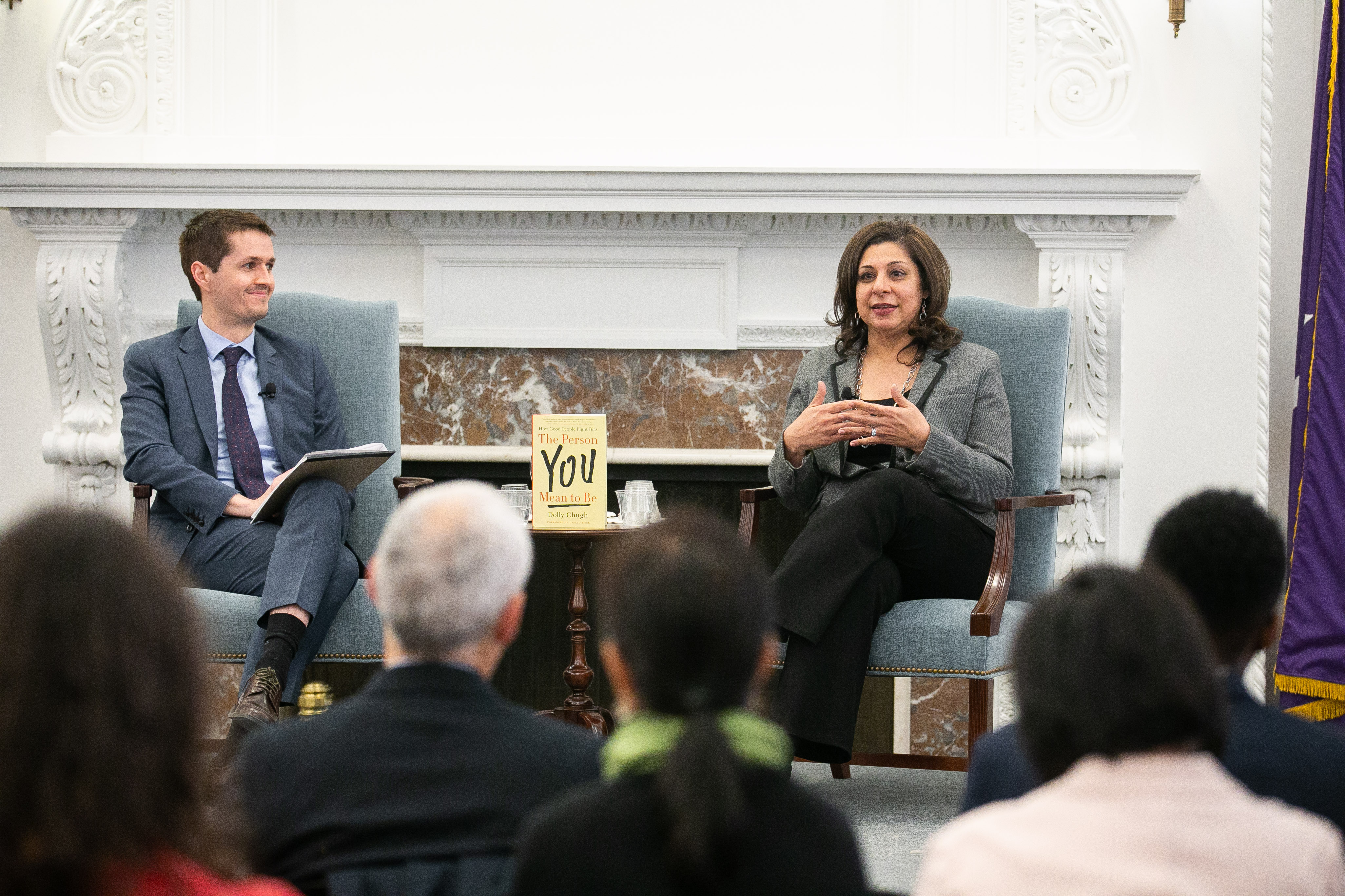 Dolly Chugh and David Glasgow speak in front of audience