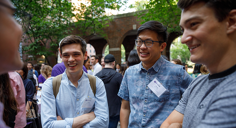 Students talking in Vanderbilt Hall Courtyard for Orientation 2019 BBQ