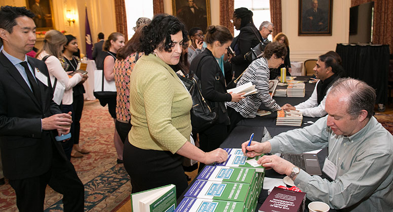 Book signing at the conference