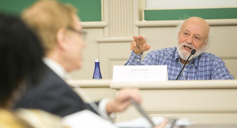 Jeff Furman speaking on a panel