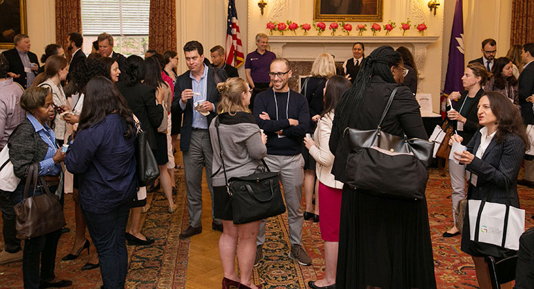 People mingling at the conference