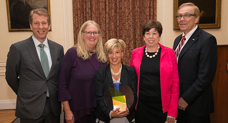 Dean Trevor Morrison, Deborah Burand, Helen Scott and Jay Grunin posing with the 2018 Grunin Prize winner