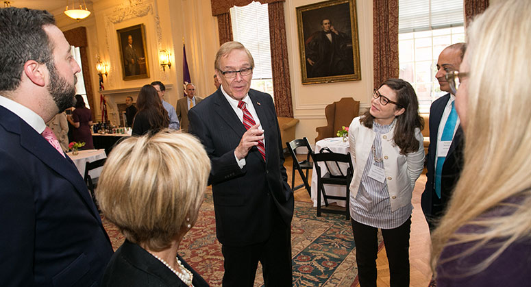 Jay Grunin speaking with the finalists