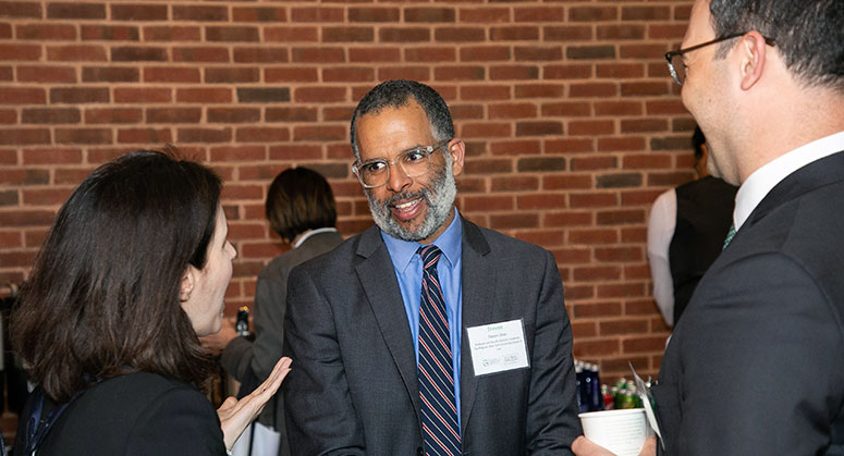 Steven Dean with Conference Attendees