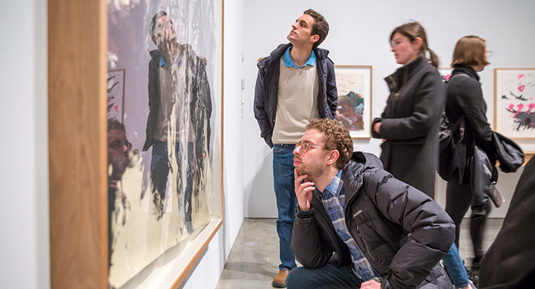 Students viewing artwork