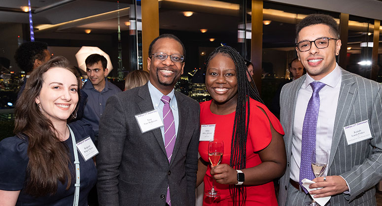Troy McKenzie '00 and other alumni at the Rainbow Room