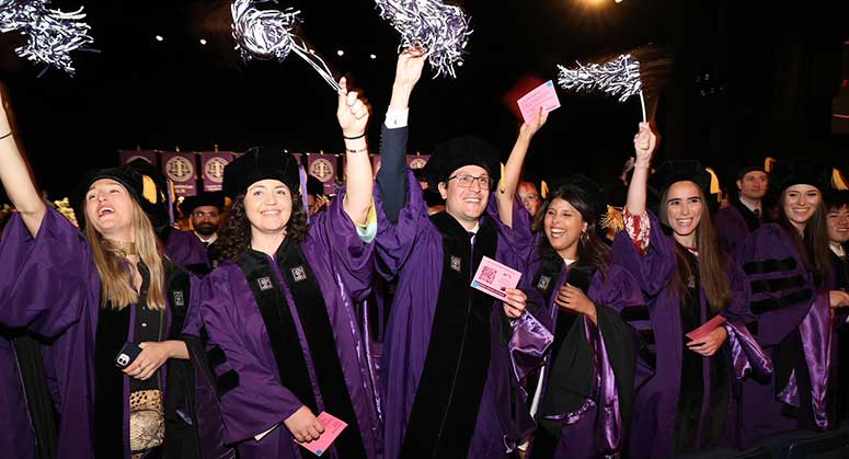 Graduates cheering at 2023 Convocation