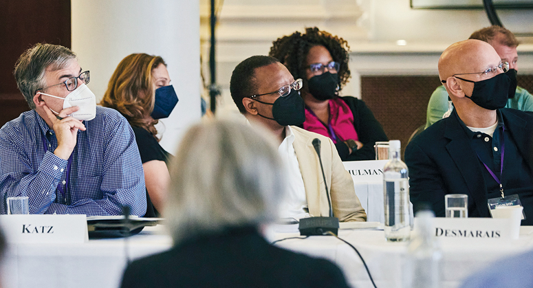 NYU Law Trustee David Katz ’88, Dean Troy McKenzie ’00, and NYU Law Trustee John Desmarais ’88