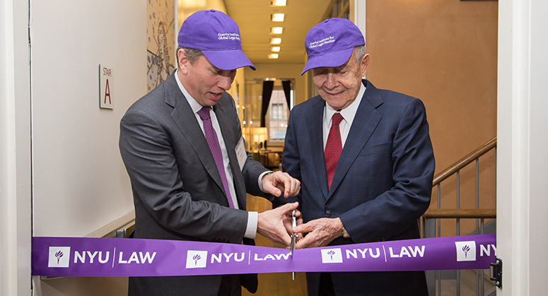 Dean Morrison cutting the ribbon with Frank Guarini