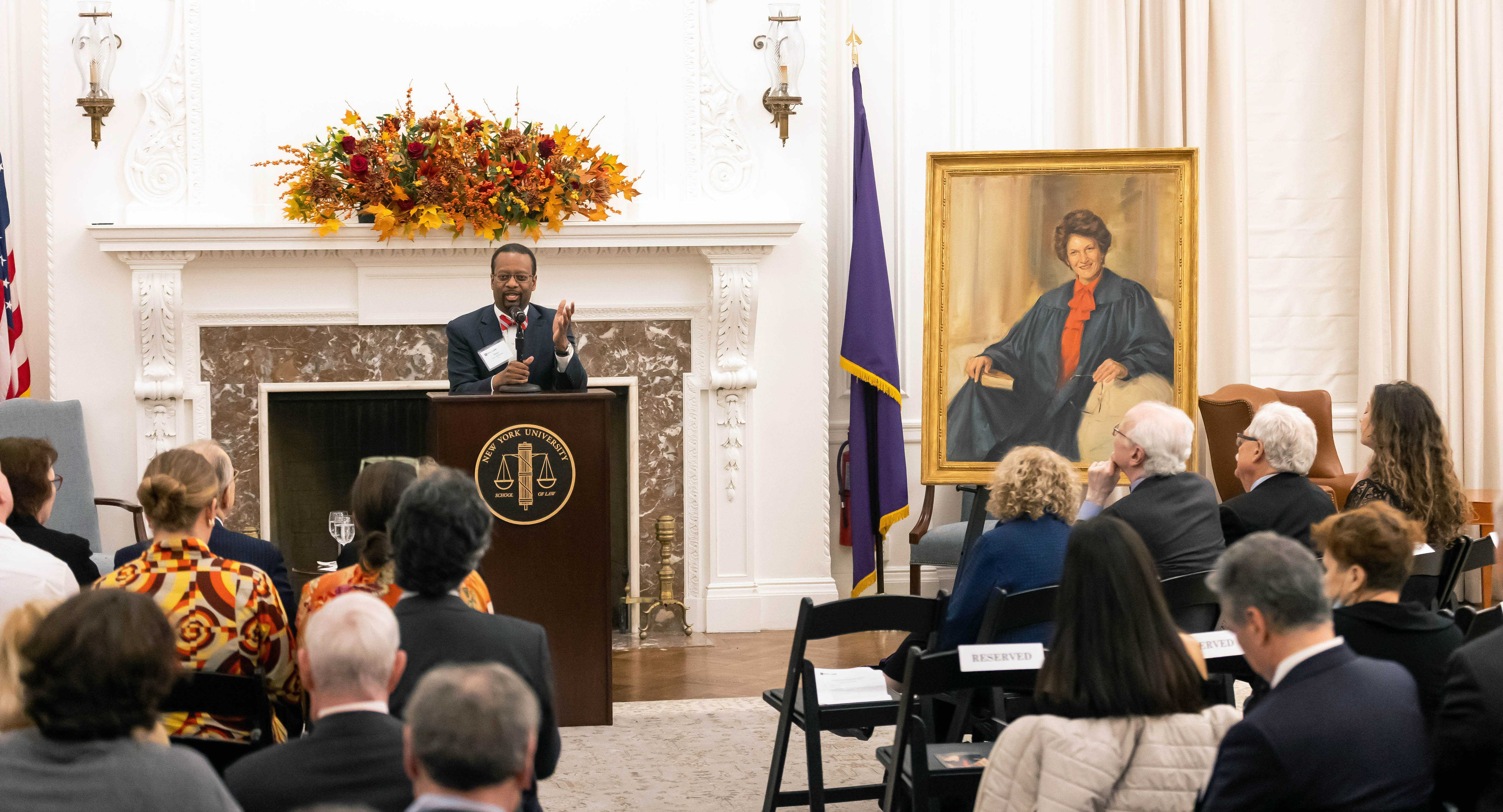 Troy McKenzie '00 speaks after Judith Kaye's portrait is unveiled