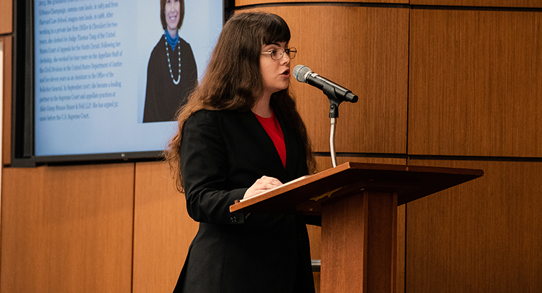 Elizabeth Bays at lectern