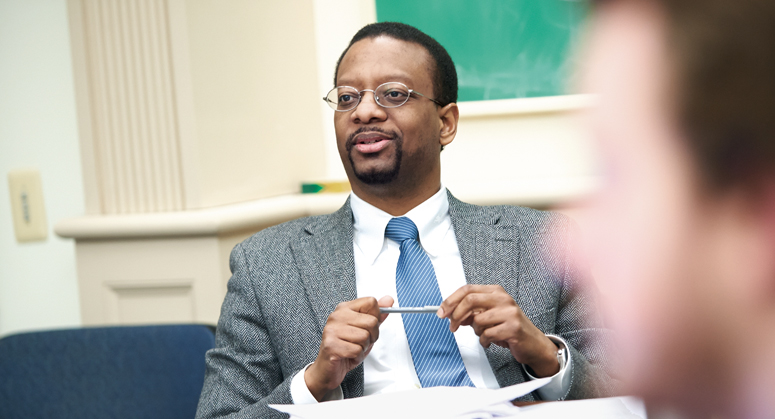 Troy McKenzie '00 in a classroom