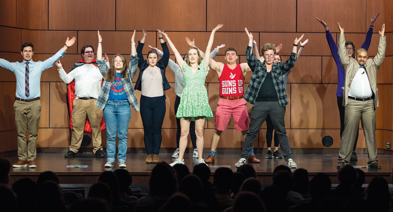 Students performing on stage at Law Revue