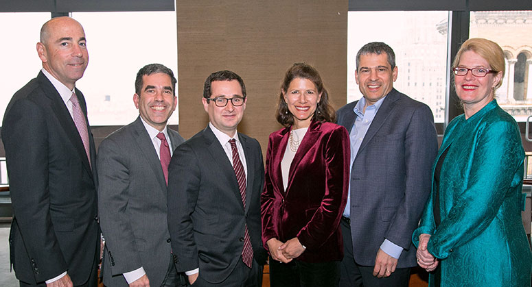 A group of panelists posing together