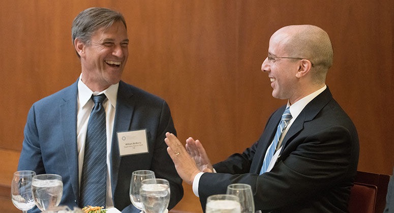 William McMurry and Matthew Queler talking at lunch