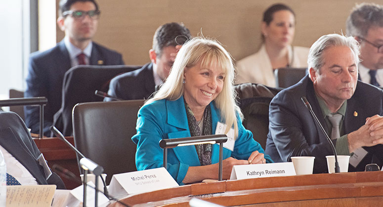 kathryn Reimann sitting on the panel