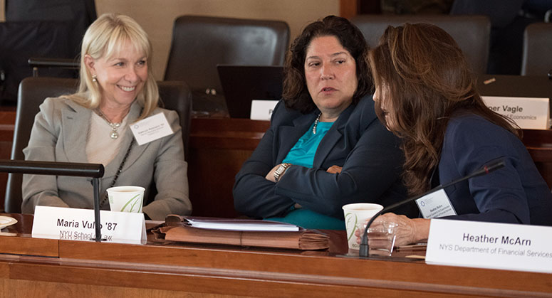 Kathryn Reimann, Maria Vullo ’87, and Heather McArn, conference participants