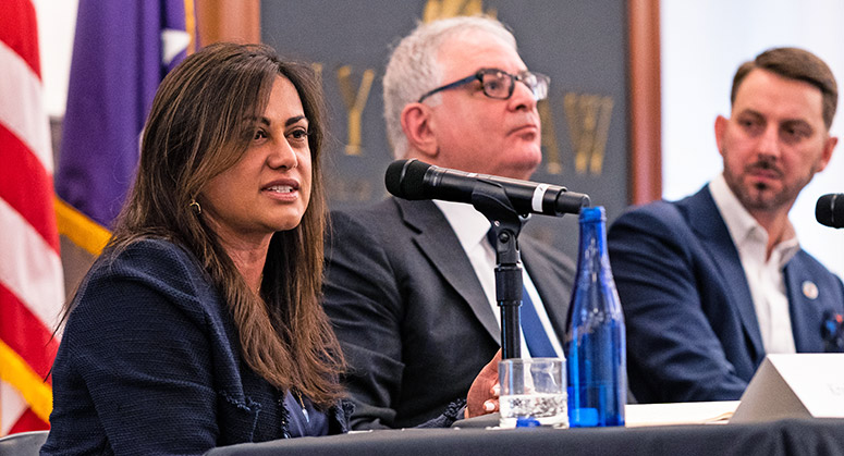 Krishna Patel, Barry Koch and James Cockayne on a panel