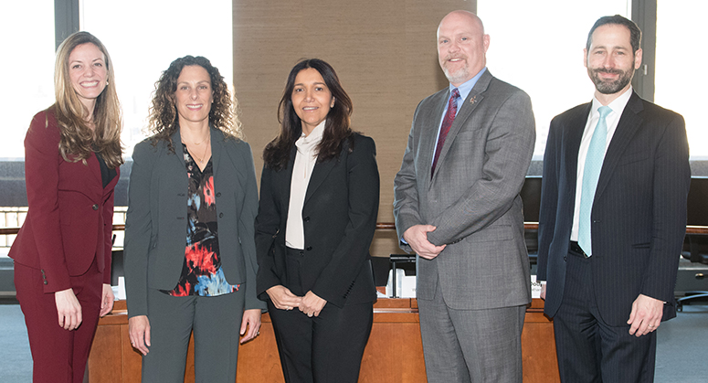 Photo of panelists standing