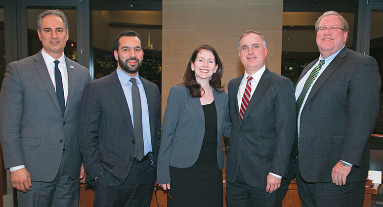 A group of panelists posing together