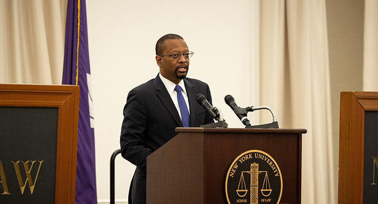 Dean Troy McKenzie '00 introduces Deputy Attorney General Lisa Monaco at NYU Law.