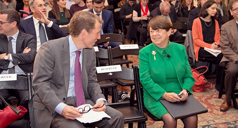 Mary Jo White speaking with Dean Trevor Morrison