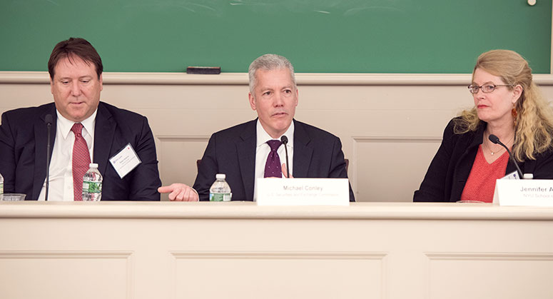 Robert Stebbins, Michael Conley and Jennifer Arlen sitting at the panel