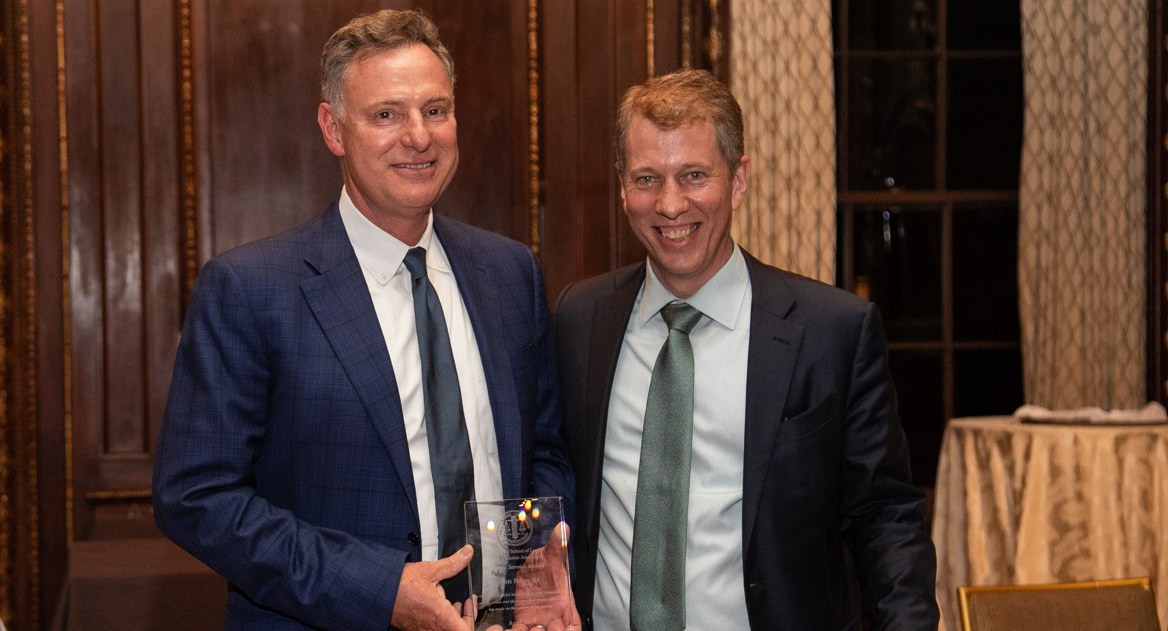 Scott Peters receiving an award from Dean Trevor Morrison at Reunion 2019