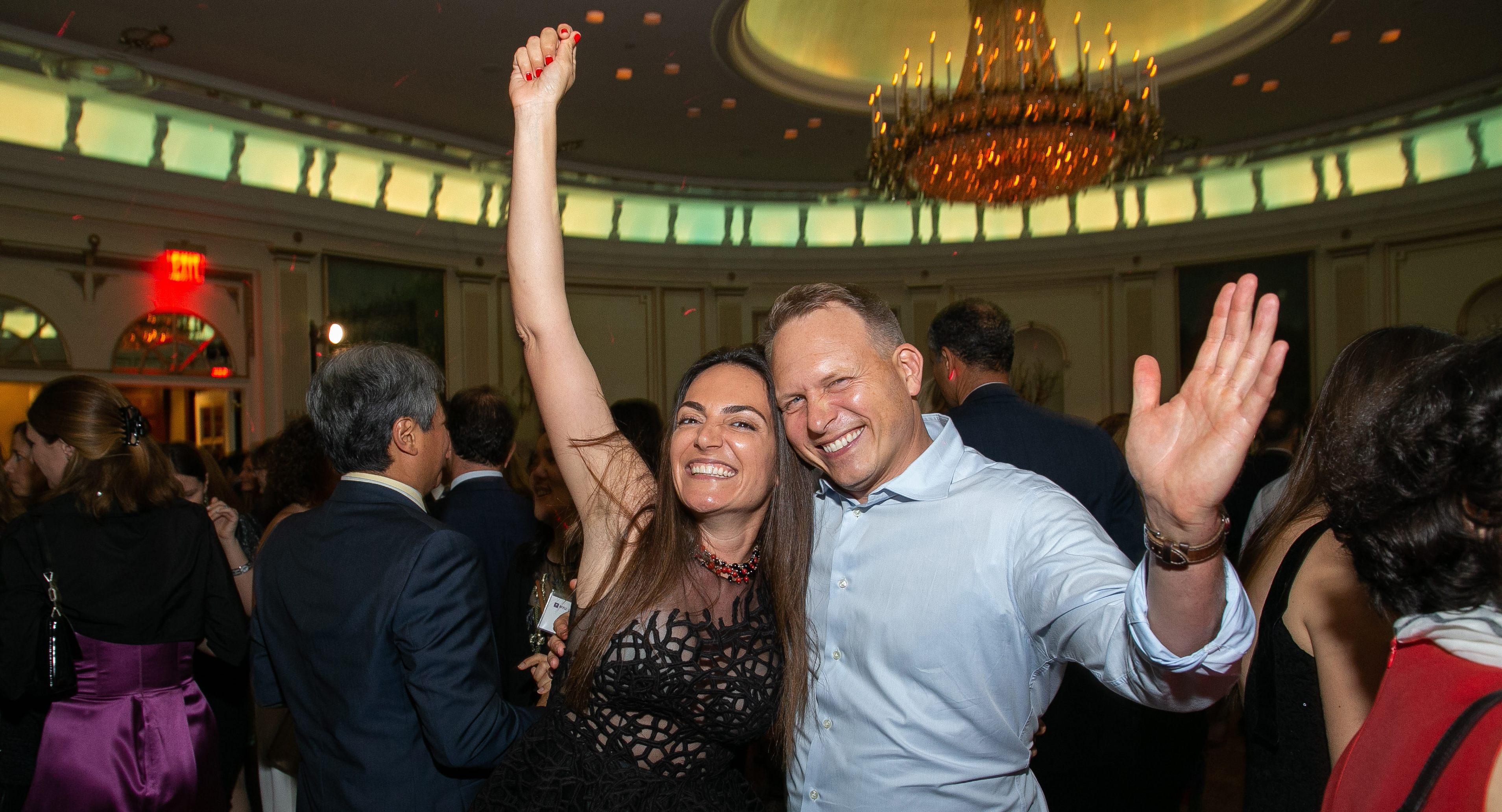 Two people celebrating and dancing at Reunion 2019