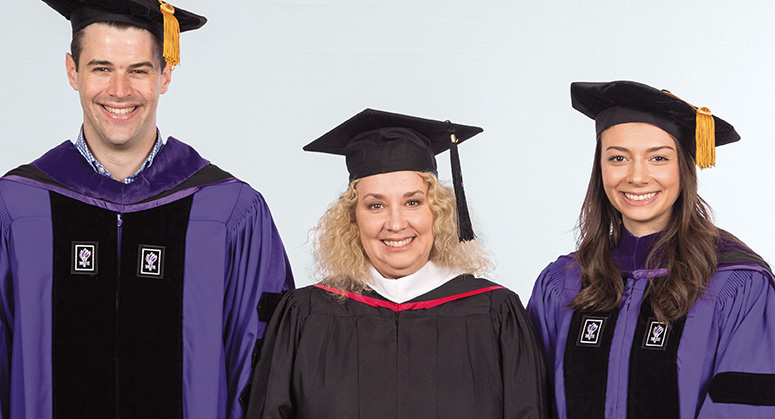 Mark A. Brisman Memorial Scholar Adam Ofman was hooded by Juliette and Rachel Brisman