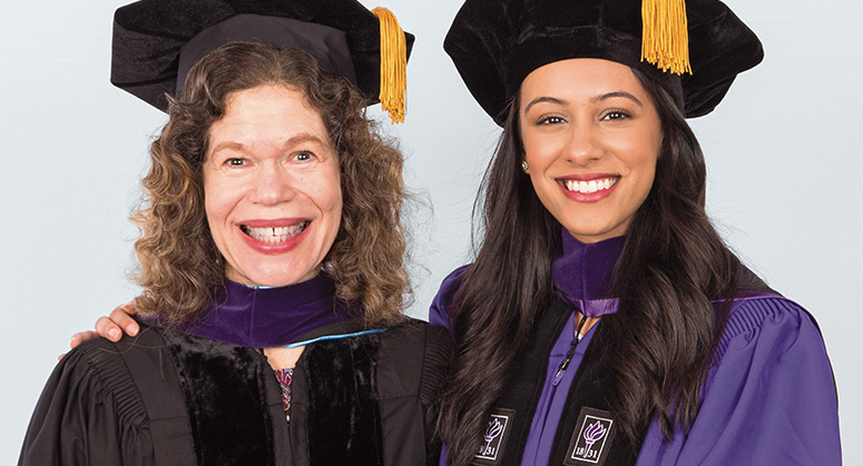 Norma Z. Paige Scholar Sidra Mahfooz was hooded by Madelyn Givant