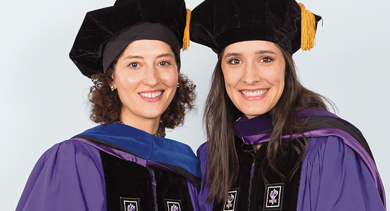 Judge M. Blane Michael Scholar Virginia Kirkland (right) was hooded by Cora Michael