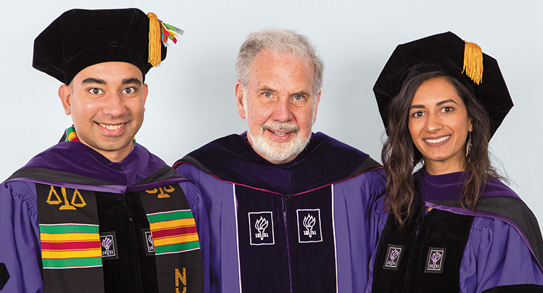 John Sexton Scholars Vladimir Alexander and Lamya Agarwala were hooded by Professor John Sexton, Benjamin F. Butler Professor of Law, President Emeritus of New York University, and Dean Emeritus of the Law School