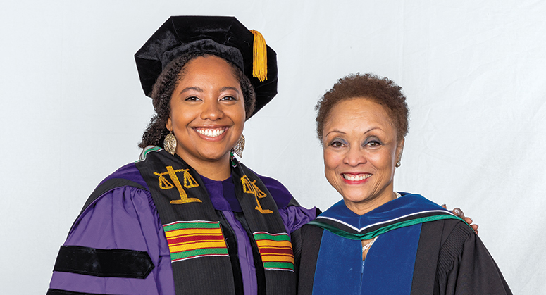 ERRICK BELL SCHOLAR FOR PUBLIC SERVICE (LACA) Michelle Fleurantin was hooded by Dr. Janet Dewart Bell