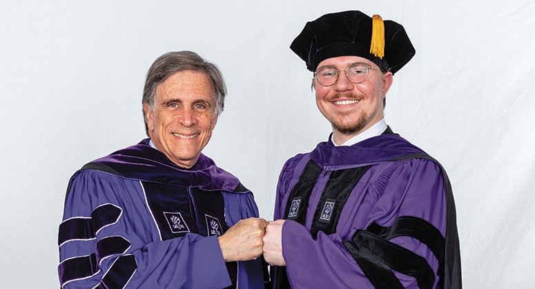 EVAN AND BARBARA CHESLER SCHOLAR Adrian Chochorek was hooded by NYU Law Trustee Evan Chesler ’75