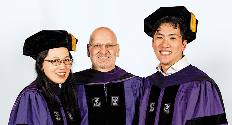 DESMARAIS LLP AND DESMARAIS LAW & TECHNOLOGY SCHOLARS Yun Lan (Law & Technology) and Jonathan Bi (LLP) were hooded by NYU Law Trustee John Desmarais ’88