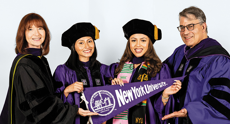 FAYE ALBERT ABSHER SCHOLARS Isabel Amaro and Kayla Hug were hooded by Cecilia Absher and NYU Law Trustee David Katz ’88