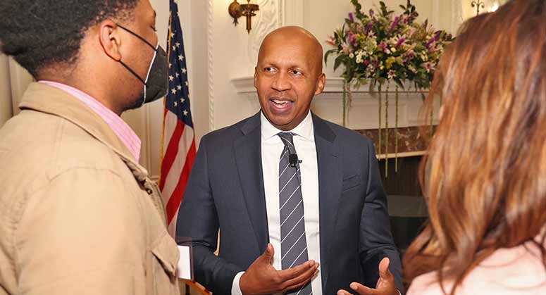 Bryan Stevenson talking with guests