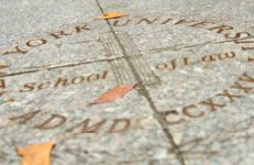 The NYU Law seal in Vanderbilt Hall Courtyard